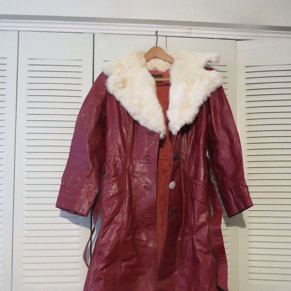 Vintage Genuine Leather Women's long coat with faux fur trim. 834